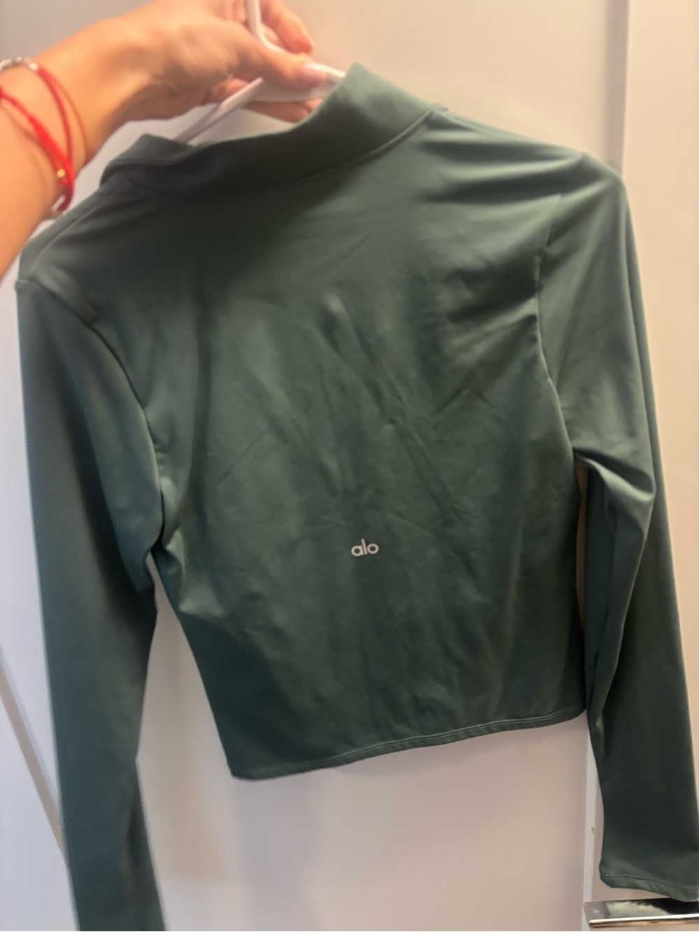 ALO Yoga Women's Long-Sleeve Quarter Zip Top in Sage - Picture 2 of 3
